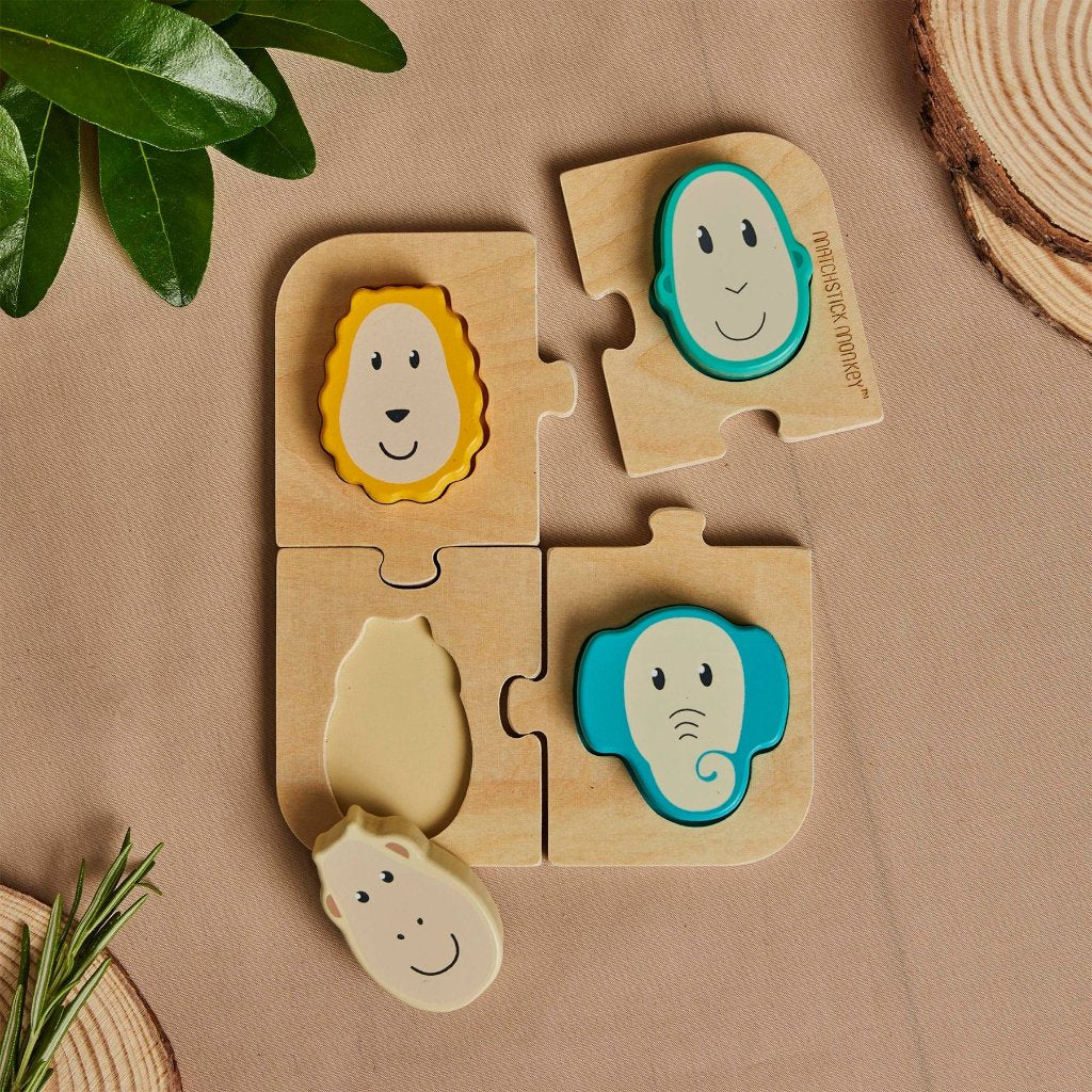 Wooden sorting puzzle with two monkeys, an elephant and a lion