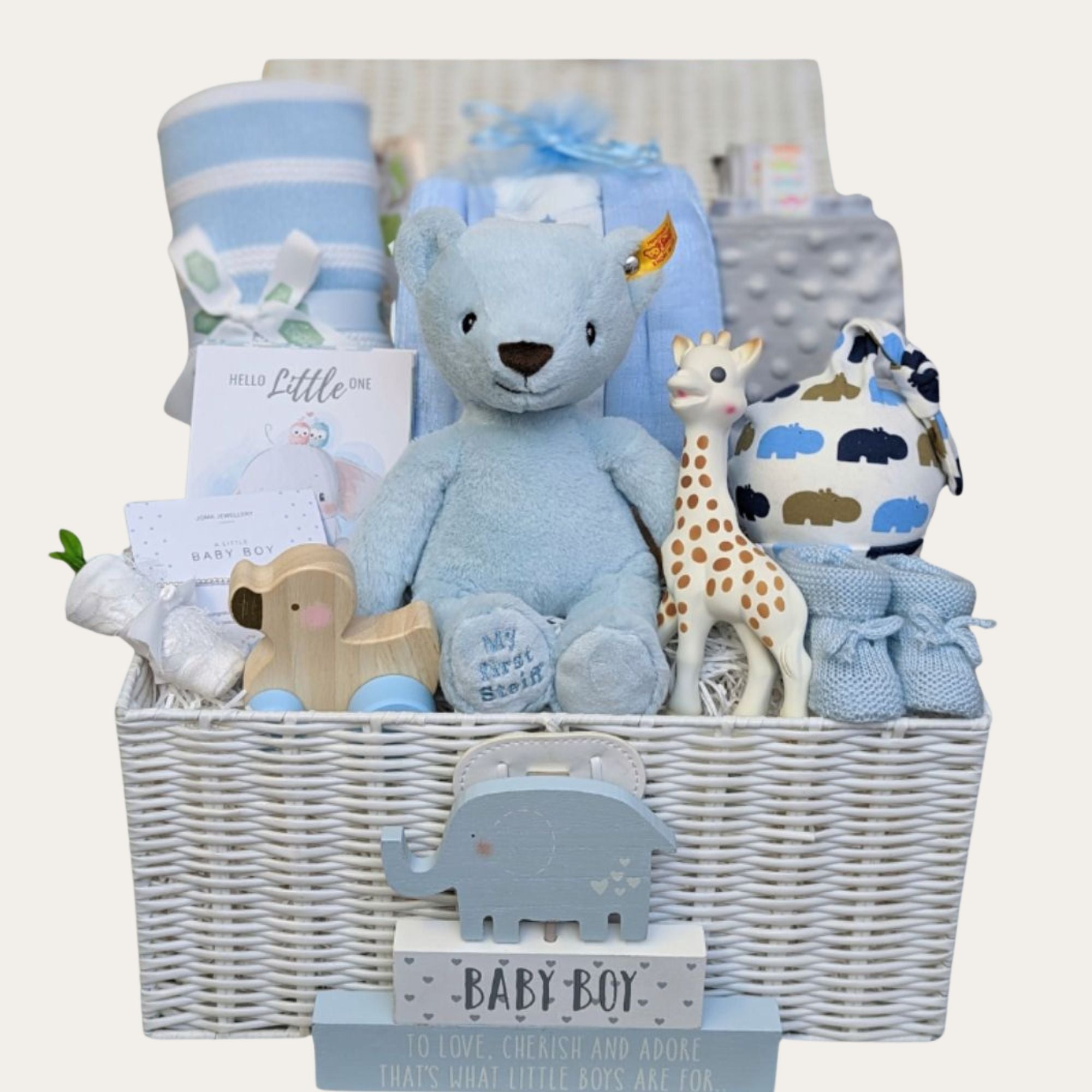 baby boy gifts hamper in blue with teddy bear, blanket, bracelet, teething toy and more