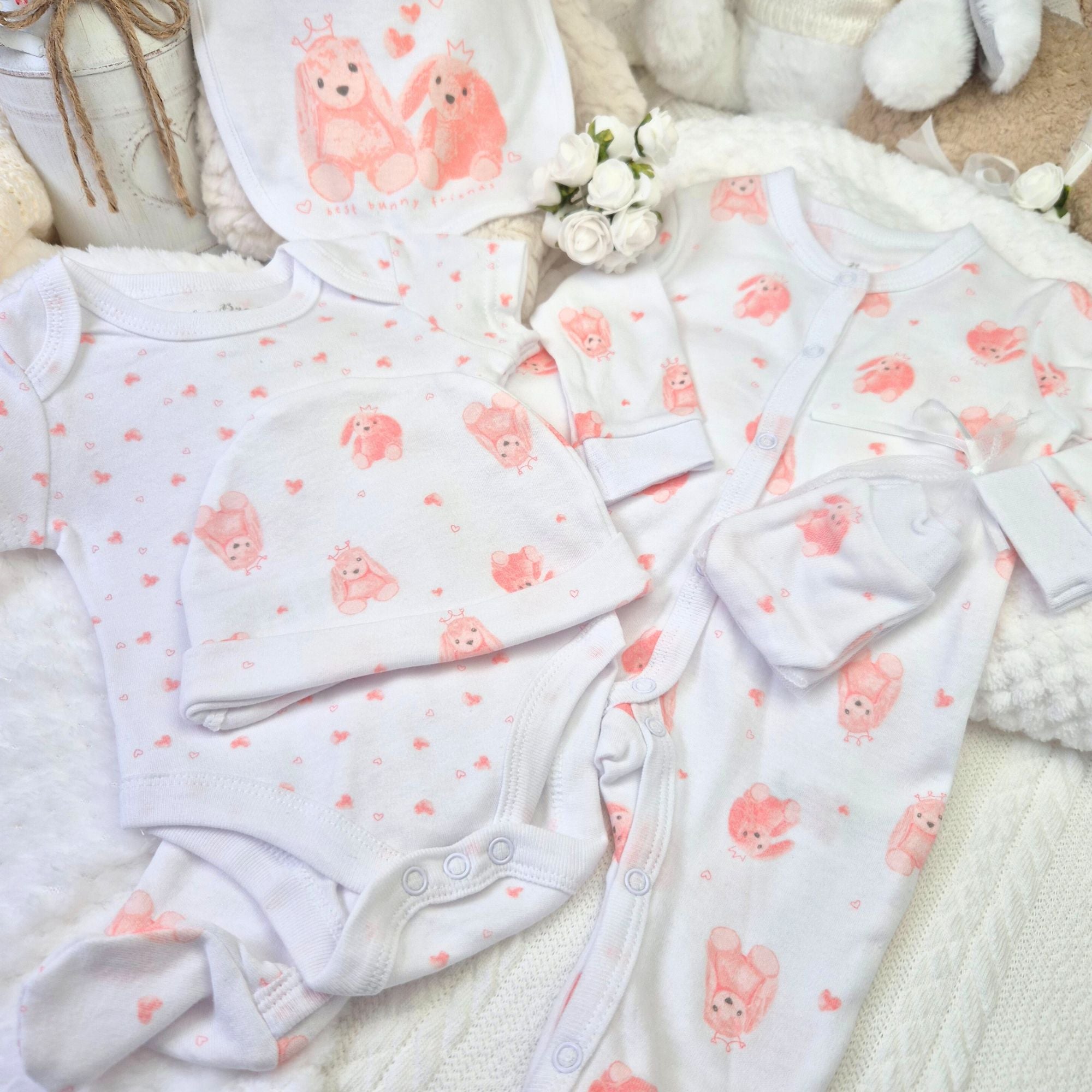 Best of Friends  5-Piece 100% Cotton Clothing Gift Set. White and pink sleepsuit, bodysuit, matching hat, practical bib, and adorable mittens. Perfect for newborns.