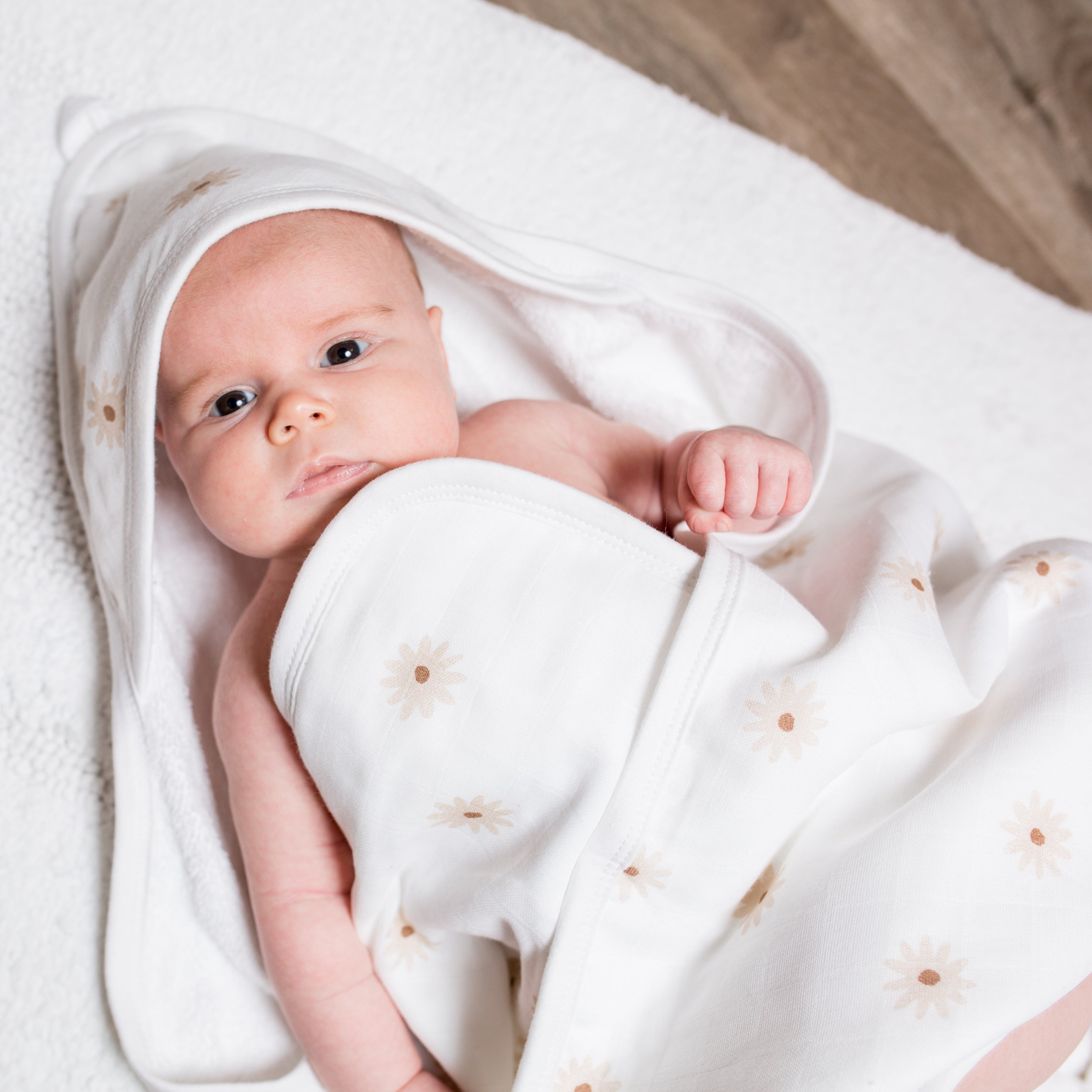 Daisy print  towel with muslin and terry cloth layers. 100% cotton, perfect for bath, beach, or pool