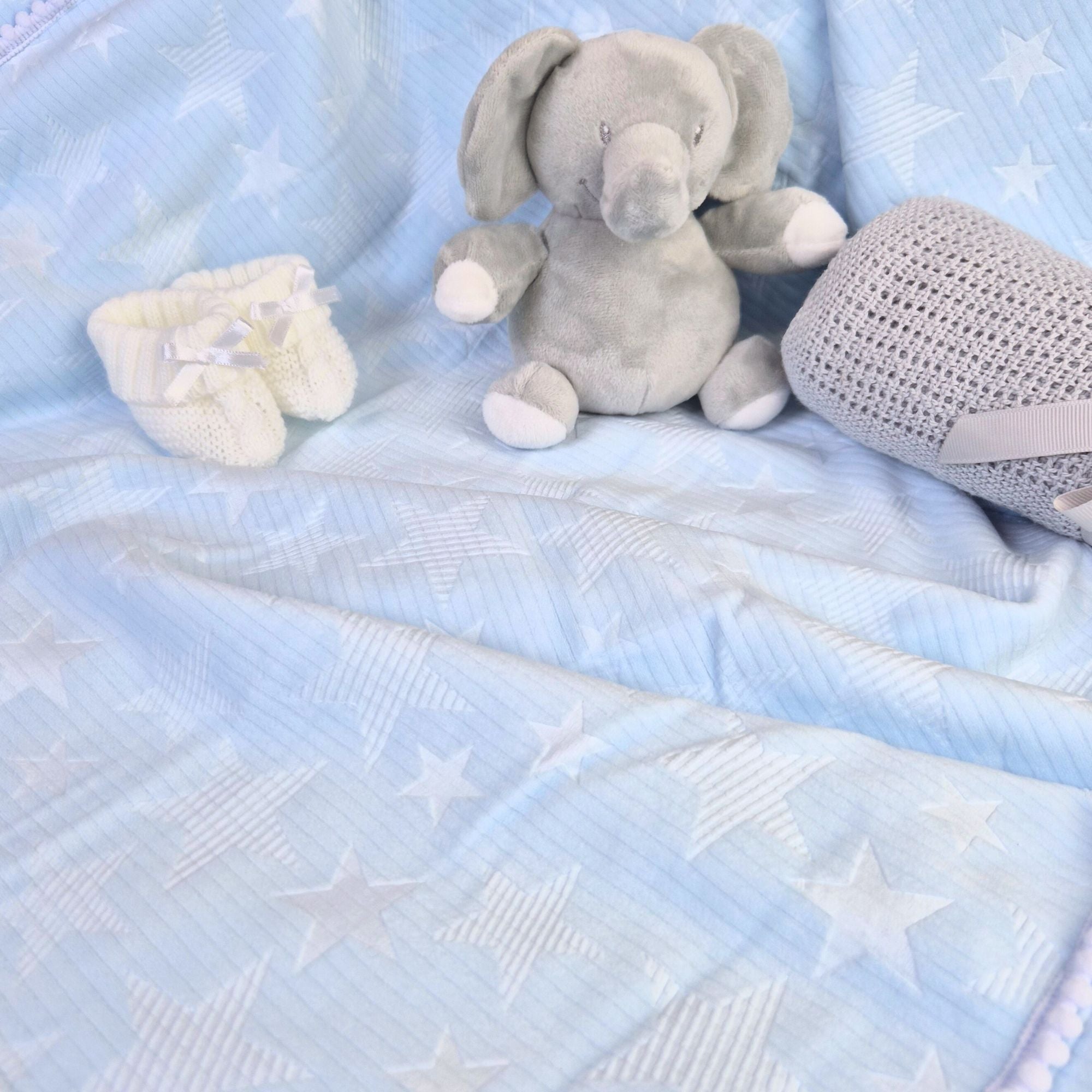 Personalisable Blue Star Embossed blanket wrap. Bumbles and Boo.