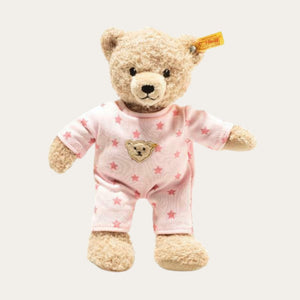 Sweet Classic Steiff Teddy Bear wearing pink Pyjamas with star pattern.  