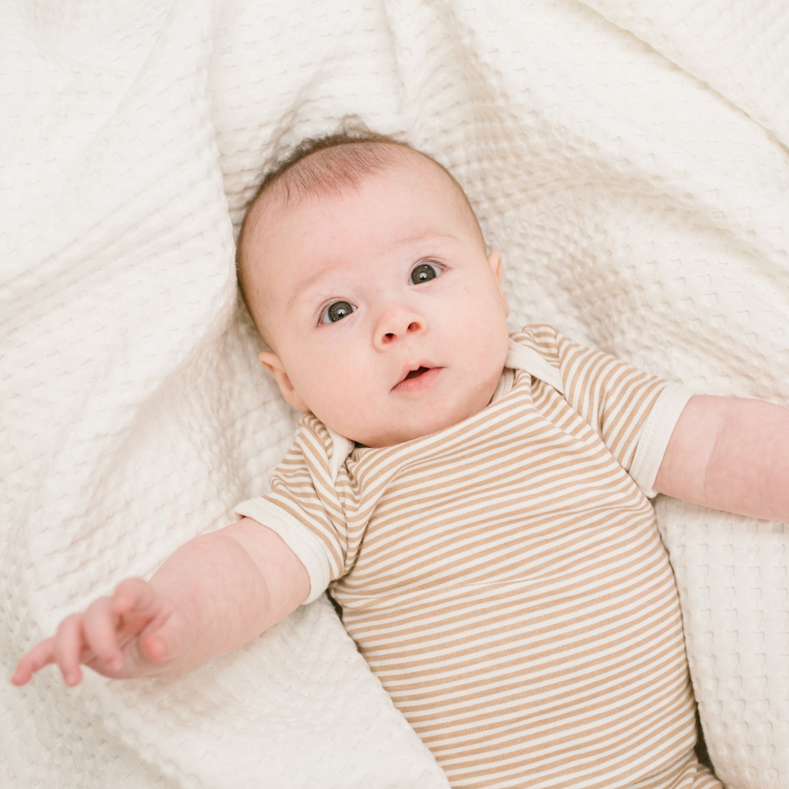 cream waffle texture baby blanket. Bumbles and Boo.