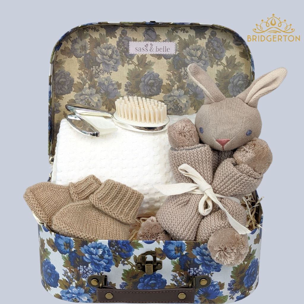 baby boy gift hamper with bridgerton theme. Includes bunny comforter, silver brush and comb, cashmere booties and baby blaket