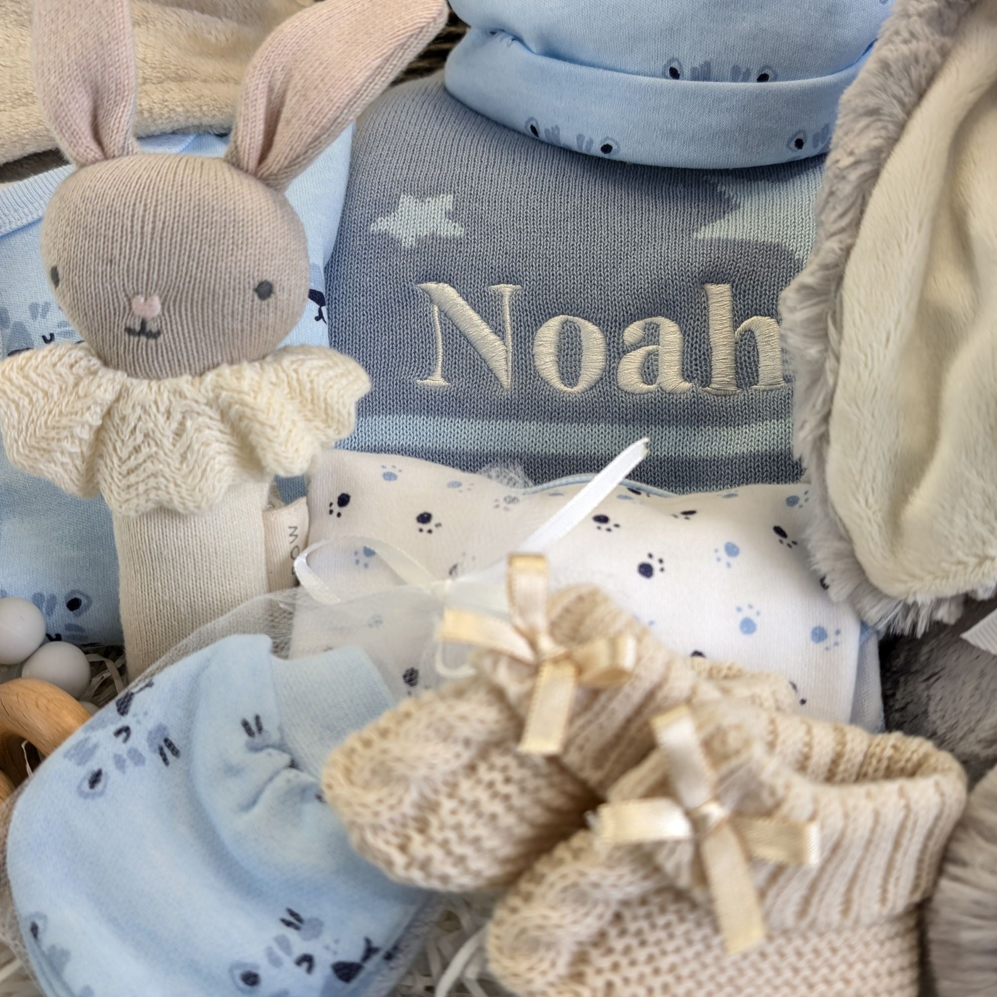 personalised baby boy hamper with bunny and clothing set.