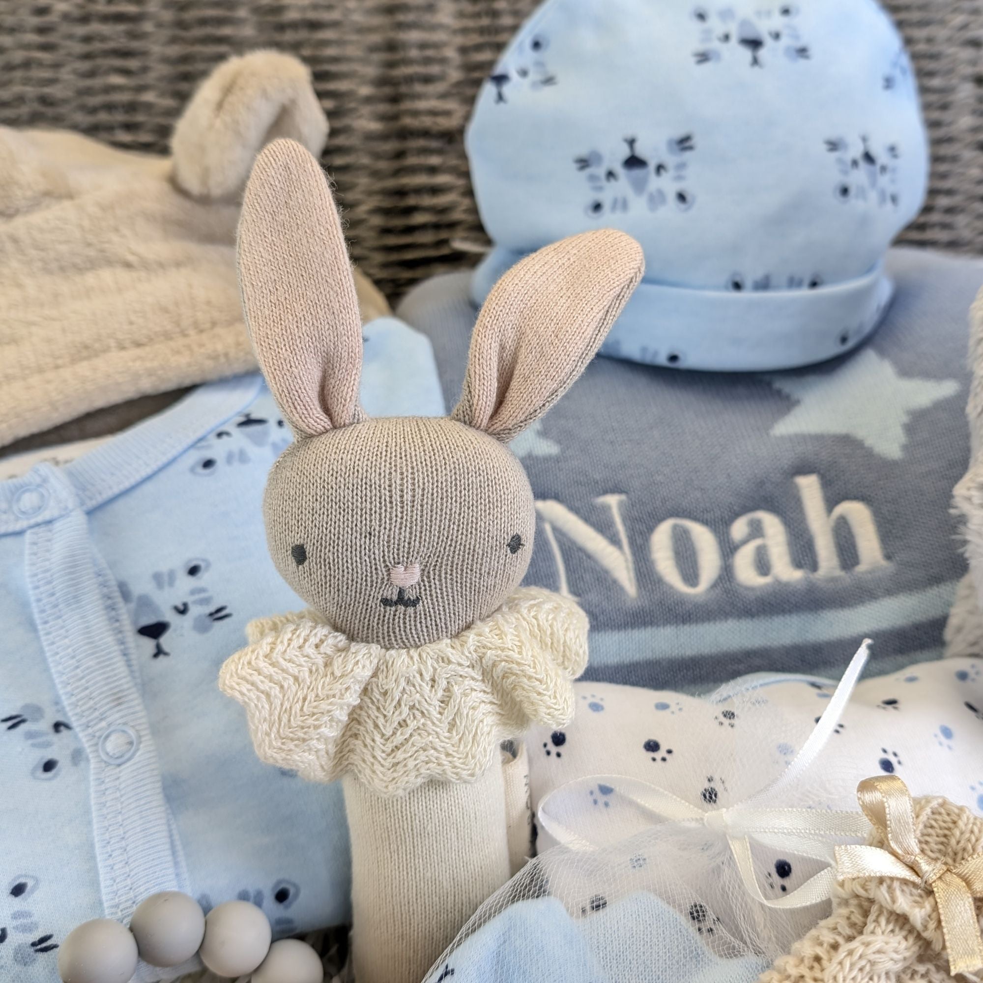 personalised baby boy hamper with bunny and clothing set.