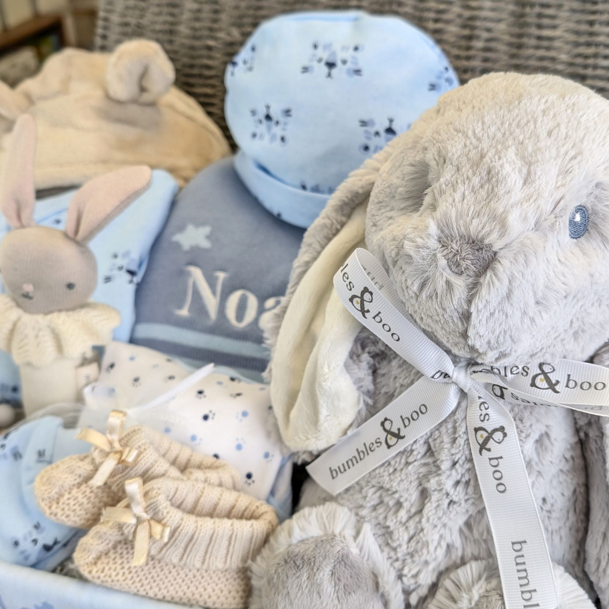 personalised baby boy hamper with bunny and clothing set.