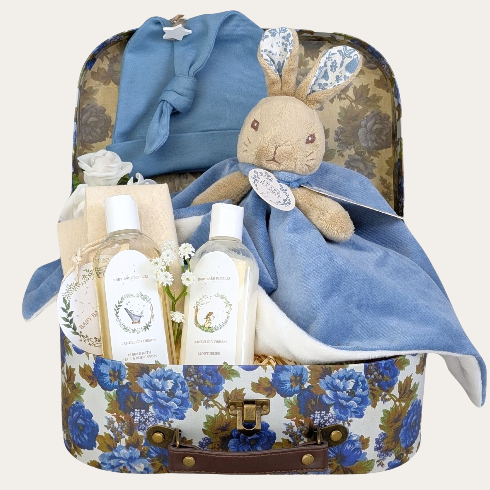 Baby boy gifts hamper with organic skincare, baby hat and peter rabbit.