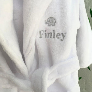 Close up of personalisation on the baby dressing gown.