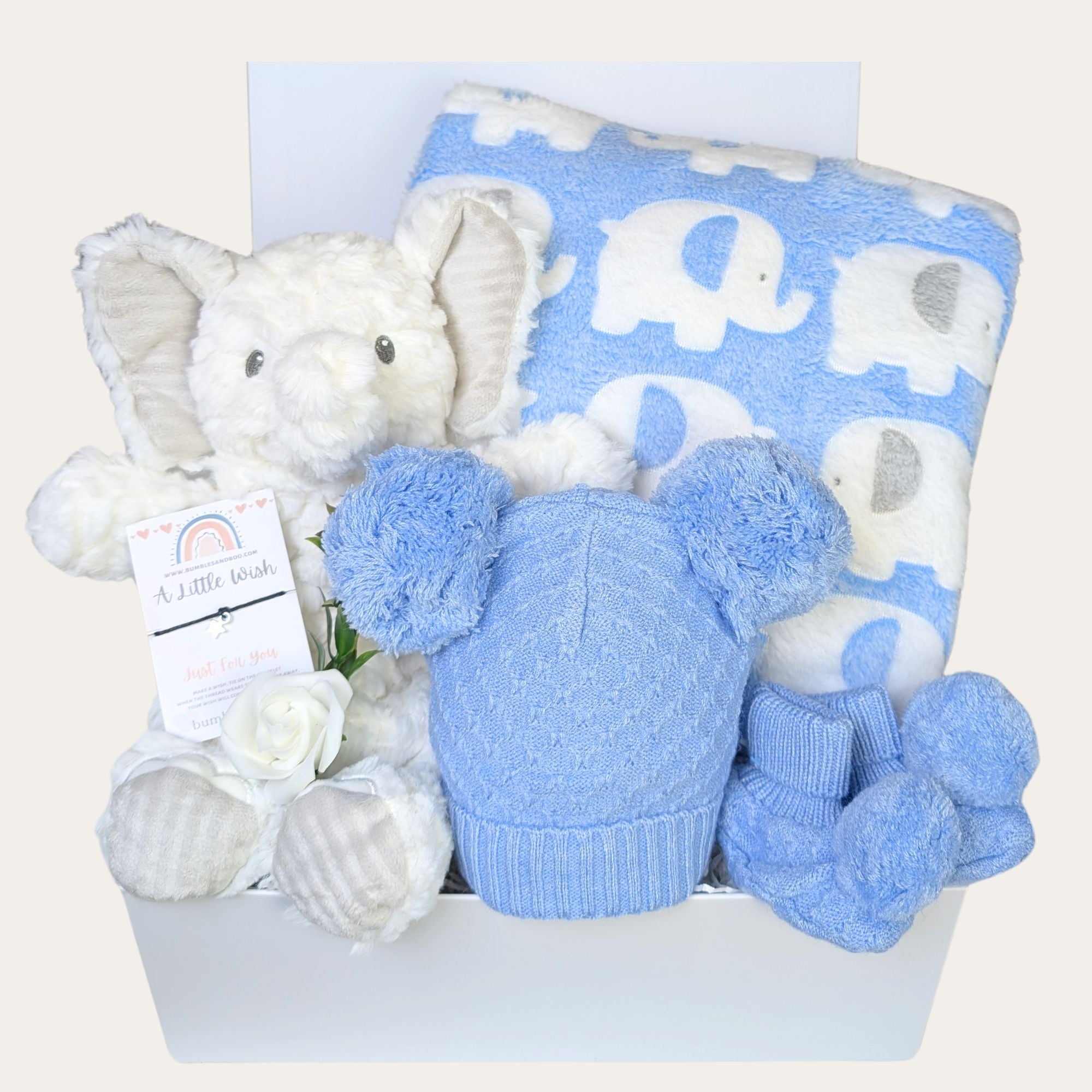 baby boy gift box hamper with elephant soft toy, blue elephant blanket and pompom hat and mittens set. Bumbles and Boo.