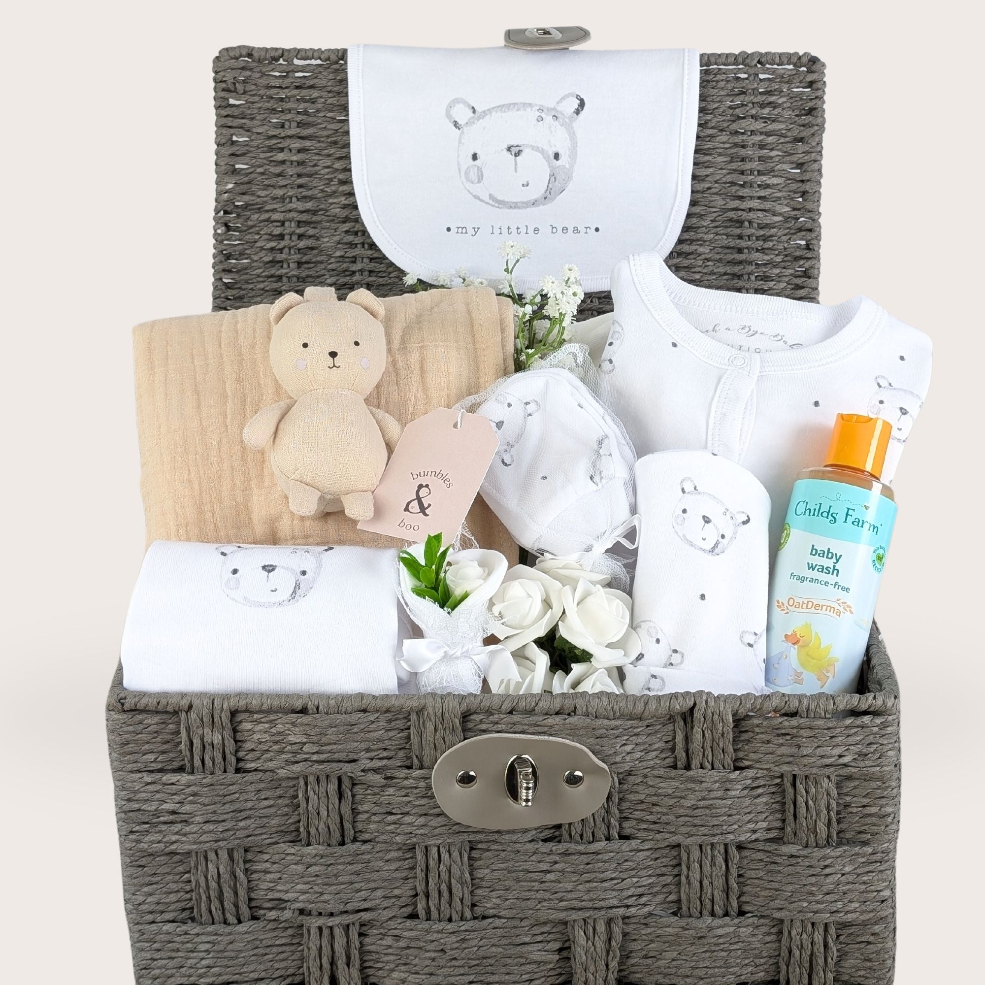 baby gifts hamper with bear clothing set, muslin blanket, pacifier holder and organic baby bubbles.