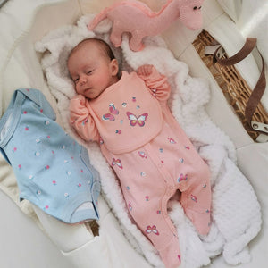 pink baby clothing with butterflies