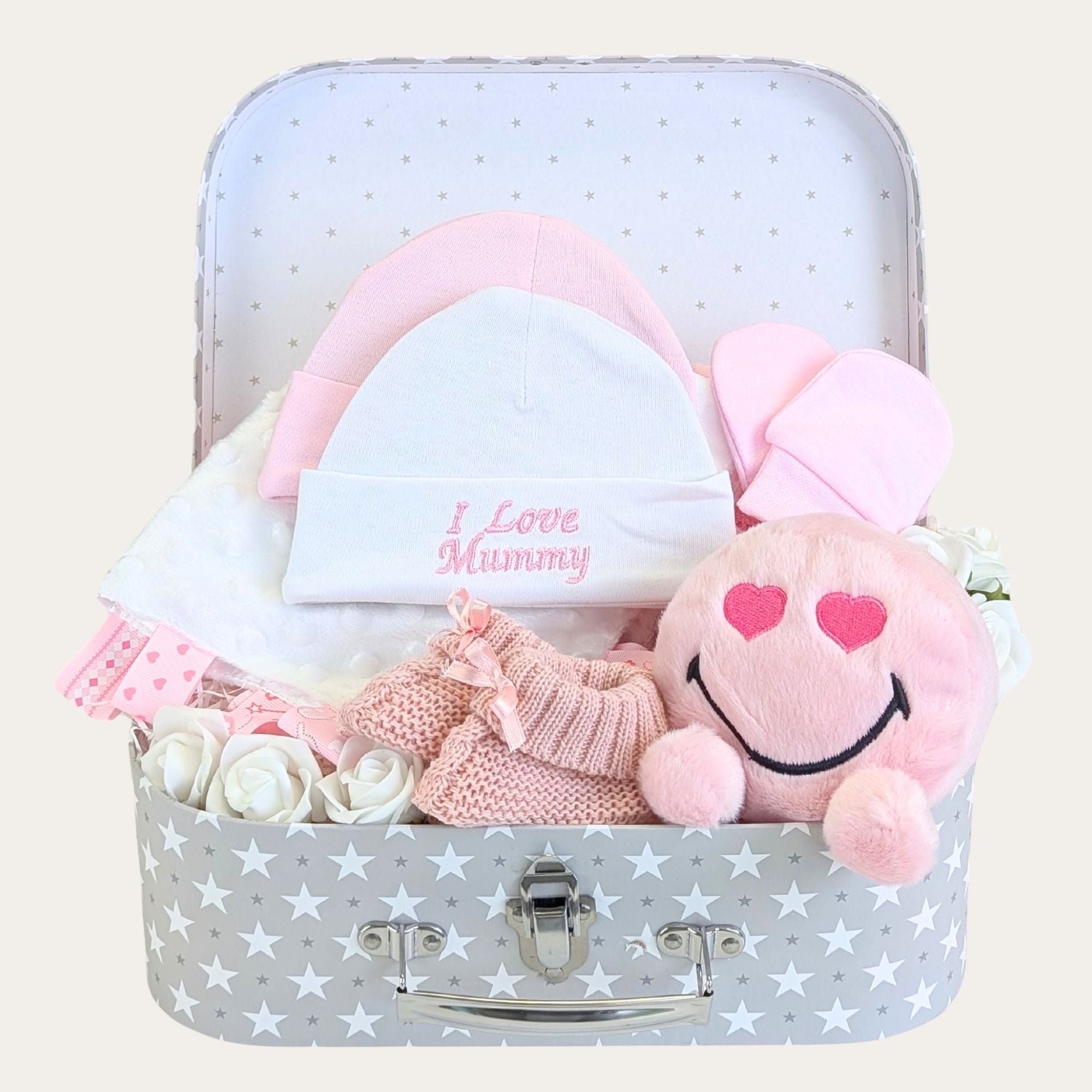 Baby girl hamper packed with pink and white gifts. Includes a plush emoji!