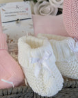 White baby booties.