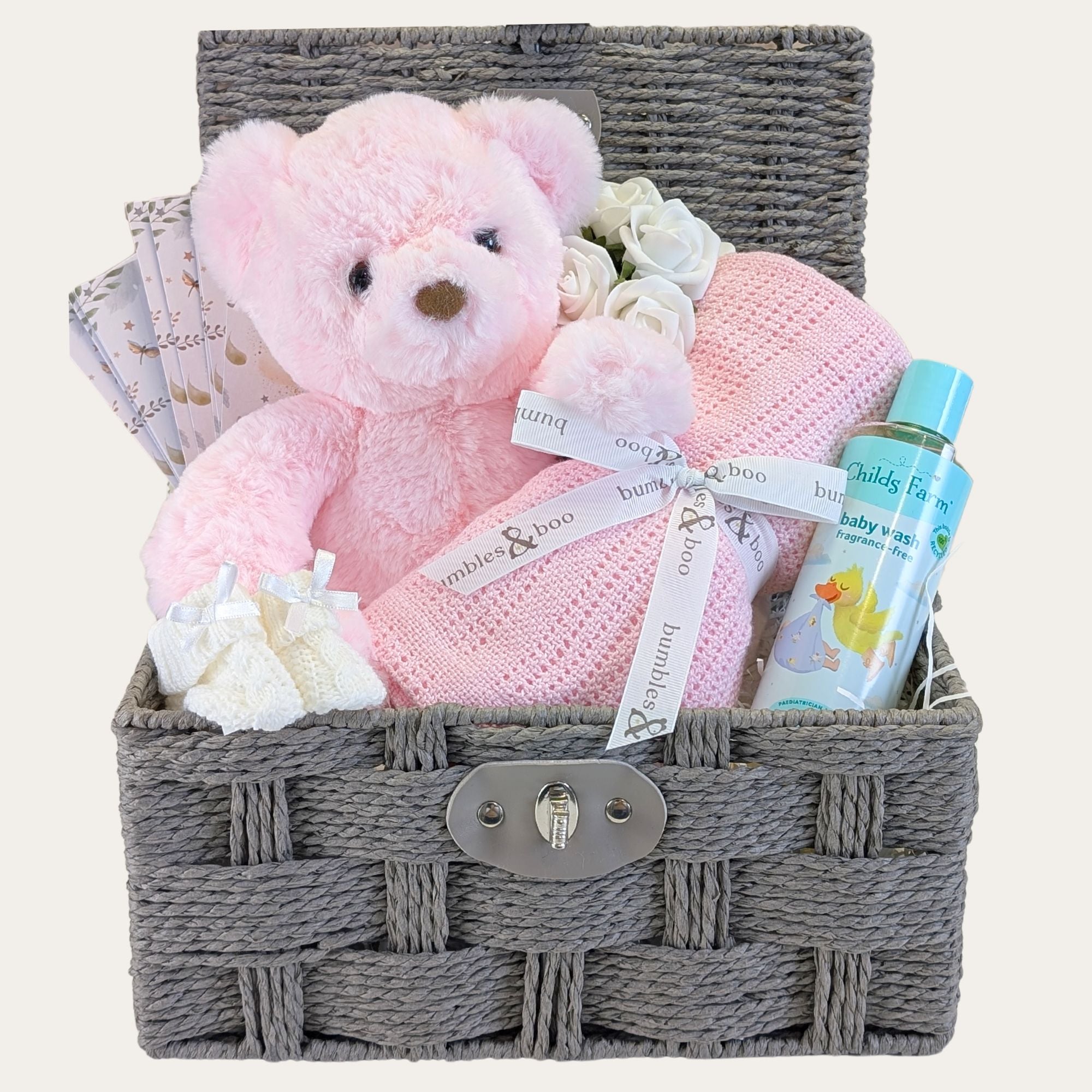 baby girl gifts hamper with pink teddy, blanket, bubble bath and milestone cards