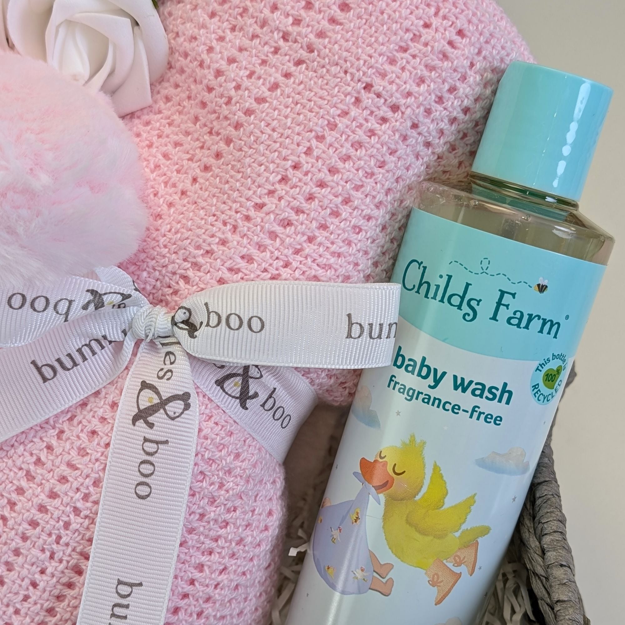 pink baby blanket and organic childs farm