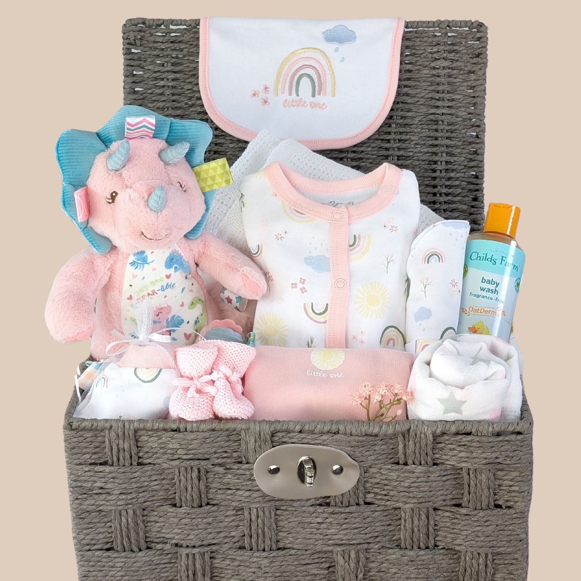 baby girl gifts basket with pink clothings set and dotty dinosaur soft toy