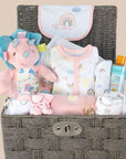 baby girl gifts basket with pink clothings set and dotty dinosaur soft toy