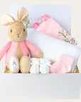 baby girl gifts box with flopsy bunny, cellular blanket, taggie comforter, baby socks and baby booties.