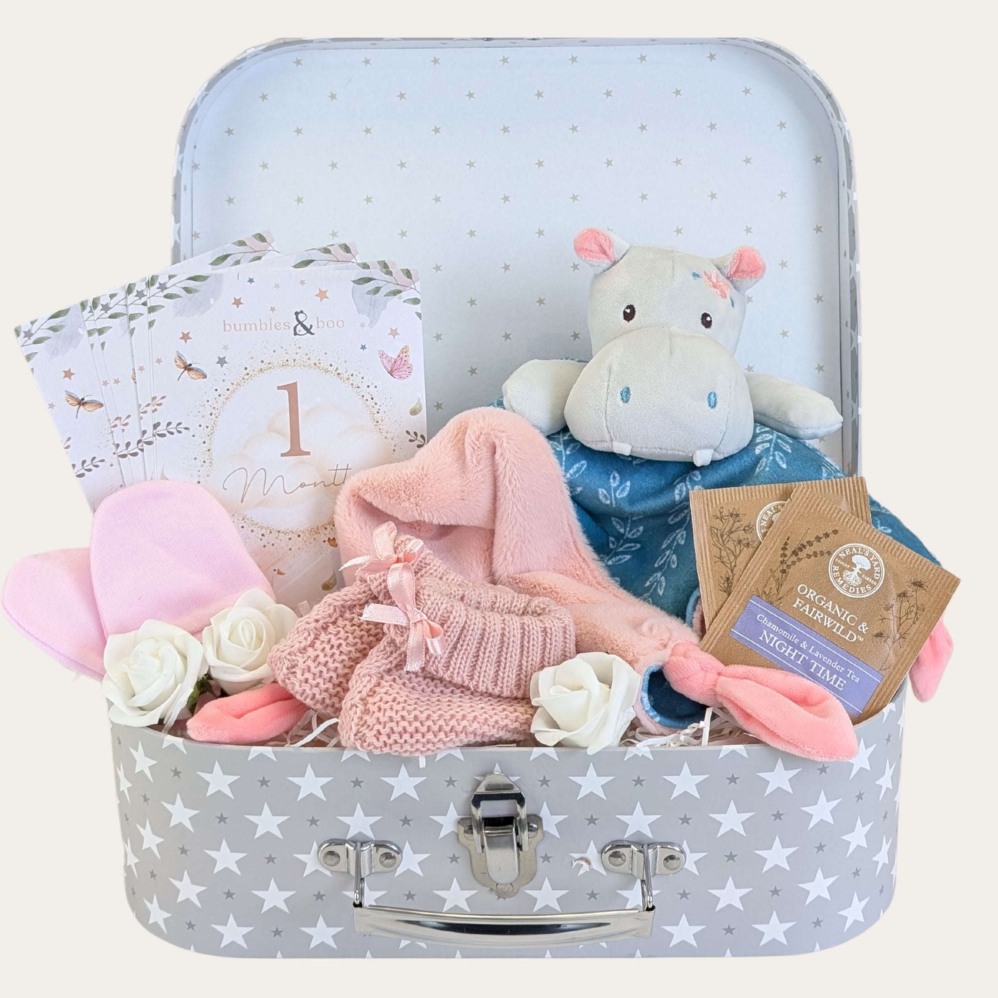 new baby girl gifts hamper with hippo baby comforter, baby booties and a treat for mum