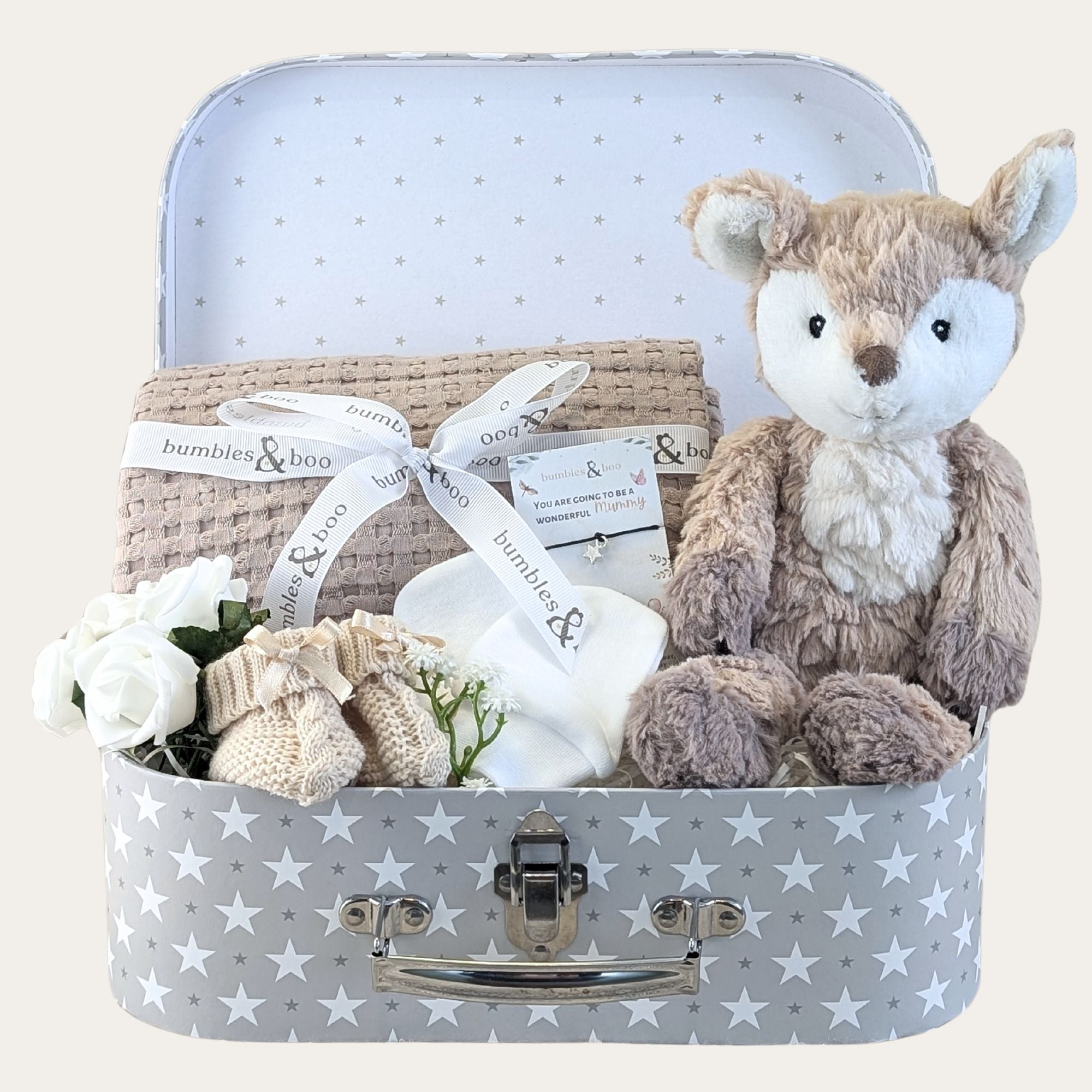 Baby girl gift hamper packed with gifts including organic blanket, fawn soft toy, mittens and socks.