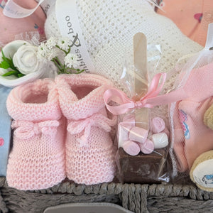 baby girl hamper with clothing set and peter rabbit soft toy. 