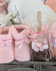 baby girl hamper with clothing set and peter rabbit soft toy. 