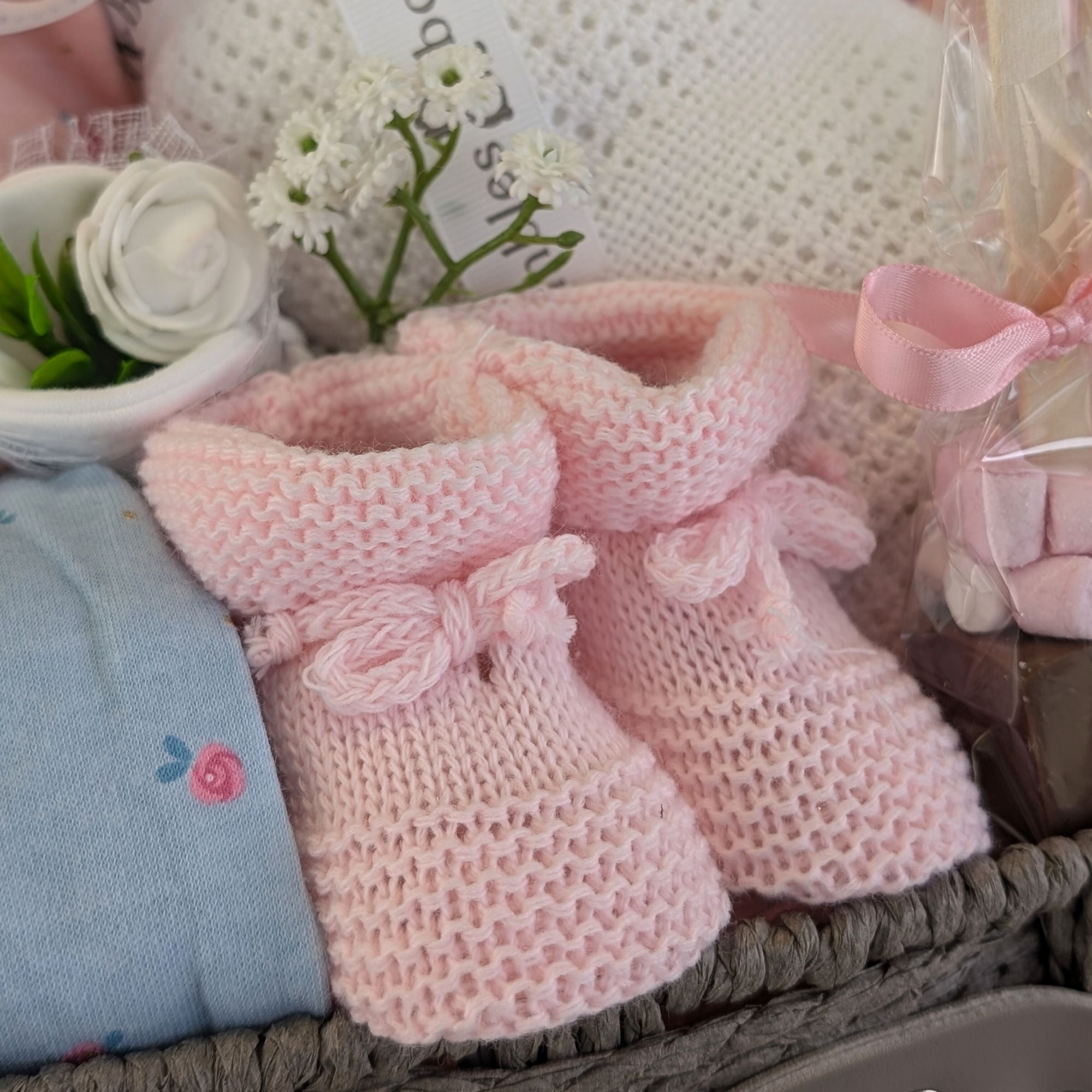 baby girl hamper with clothing set and peter rabbit soft toy. 