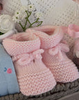 baby girl hamper with clothing set and peter rabbit soft toy. 