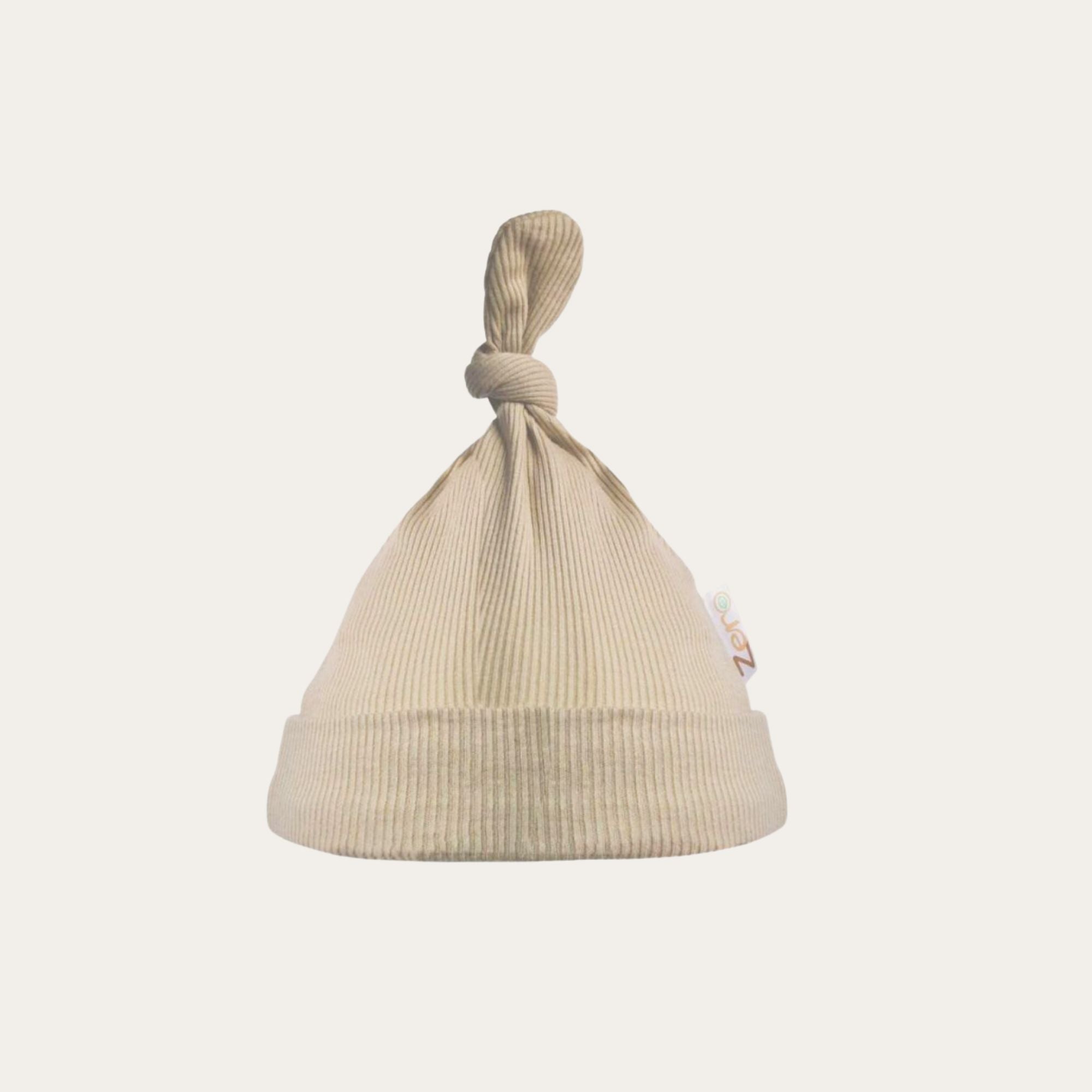 beige baby hat ribbed material with a knot