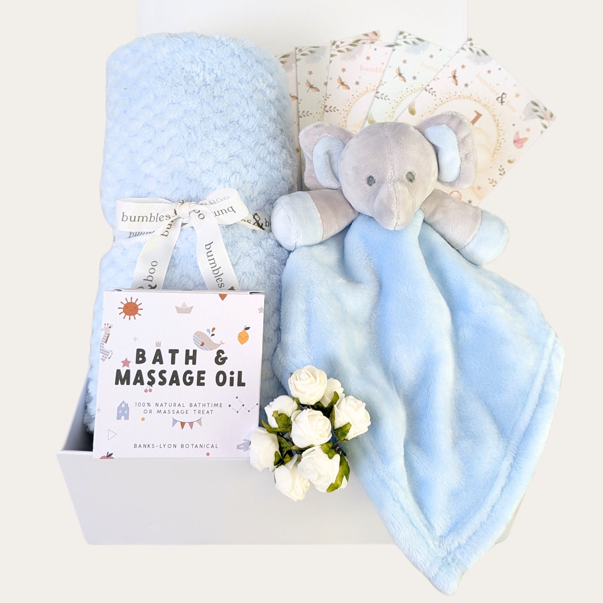 blue baby shower gift box with blanket, elephant soft toy, milestone cards and bath and massage oil. Bumbles and Boo.