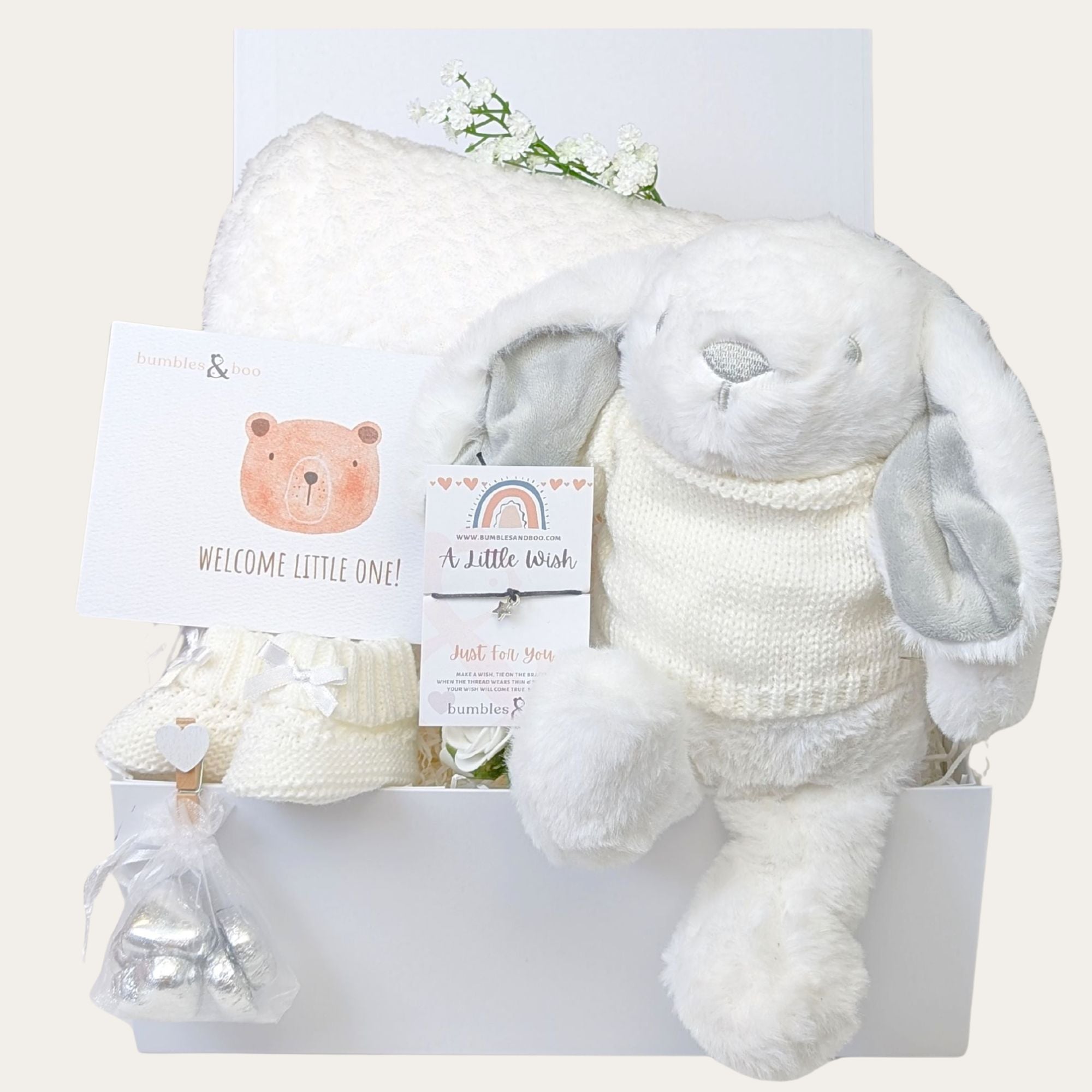 baby shower gifts box with white bunny, baby booties, baby blanket and wish string.