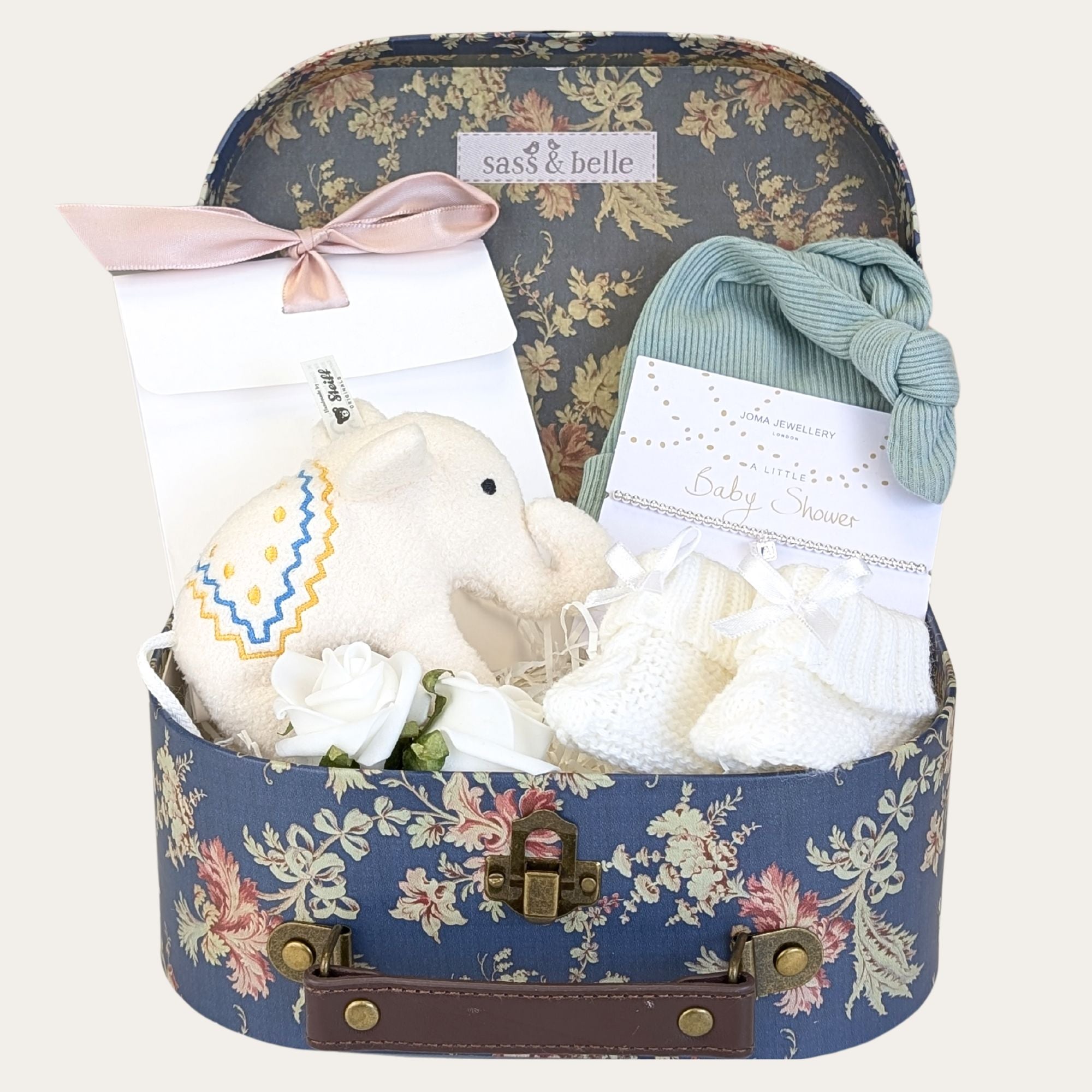 baby shower gifts hamper in classic blue with elephant rattle and silver bracelet. 