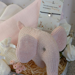 Close up of baby shower hamper contents.