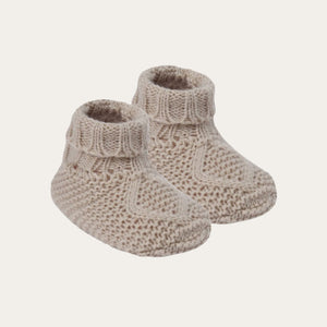 Biscuit beige cable knit soft baby booties. Warm and cosy for keeping baby toes snuggly. 