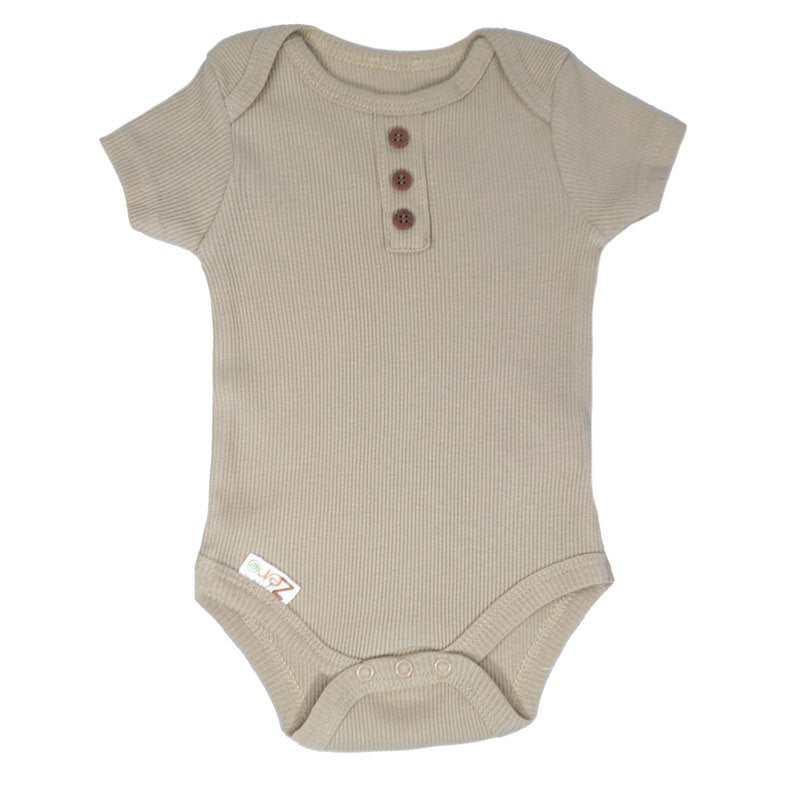 An oeko Tex biscuit coloured body suit