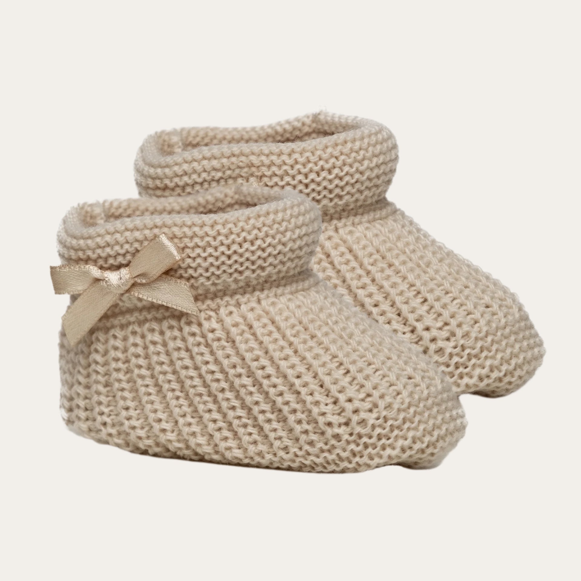 biscuit plain knit baby bootees with bow detail for newborns