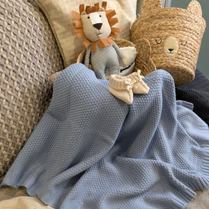 Dusky blue knitted baby boy blanket.