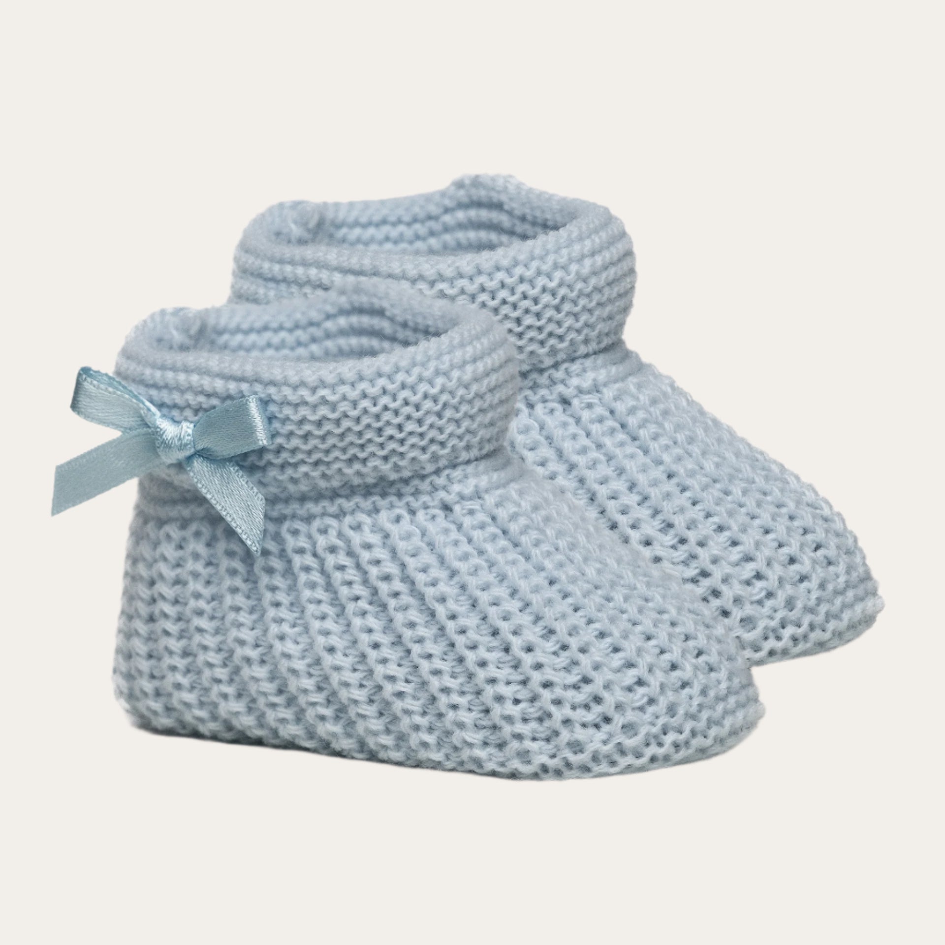 blue plain knit baby bootees with bow detail for newborns