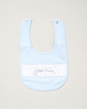 blue baby bib which reads Little Prince