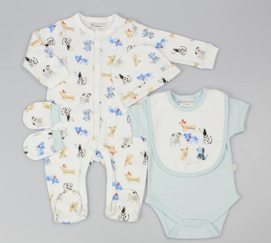 5 piece white baby outfit with puppy motifs. Contains sleepsuit, blue bodysuit, bib, hat and mittens