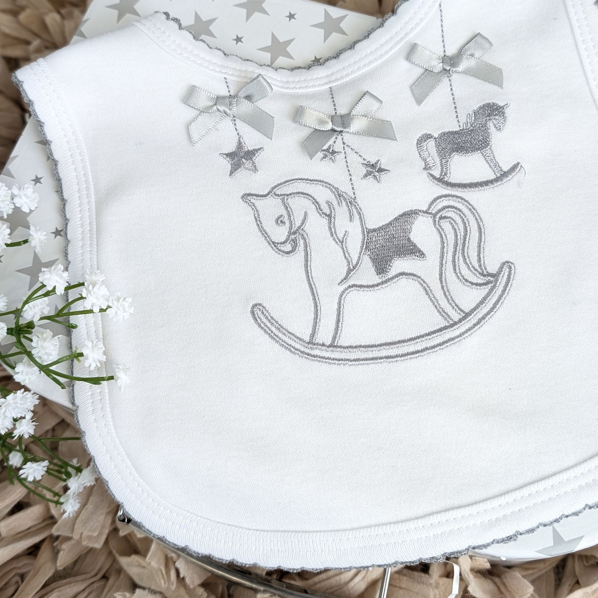 Grey rocking horse baby bib – soft white cotton bib with embroidery & grey trim – Bumbles and Boo.