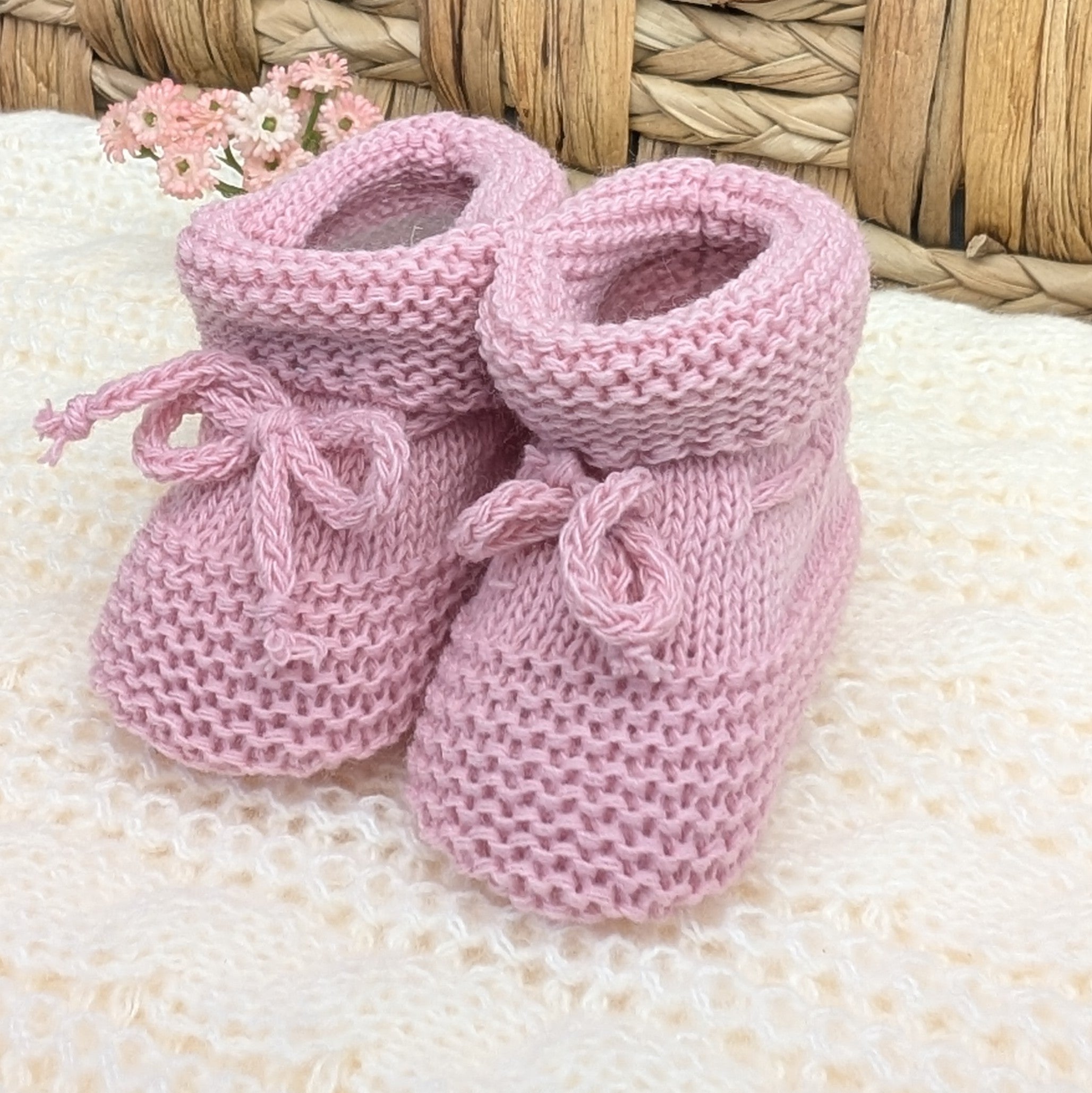 oft pink knitted baby booties with ties – cosy and warm for newborns – Bumbles and Boo.