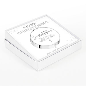 A silver baptism bangle for a boy or girl with a silver cross to mark a Christening