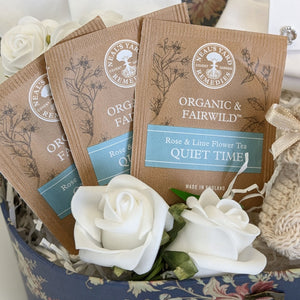 Close up of organic tea bags in a baby shower gifts hamper.