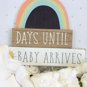 close up of a pregnancy mantel plaque which reads days until baby arrives