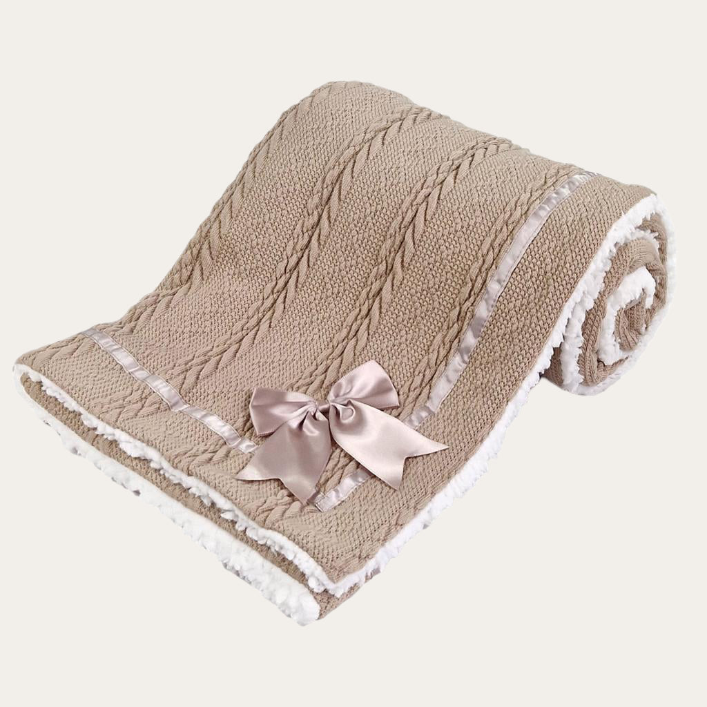 coffee Sherpa Back Knit Blanket folded neatly, showing the satin bow