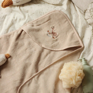 Organic Hooded Baby Towel with deer motif on the hood. A neutral beige colour.