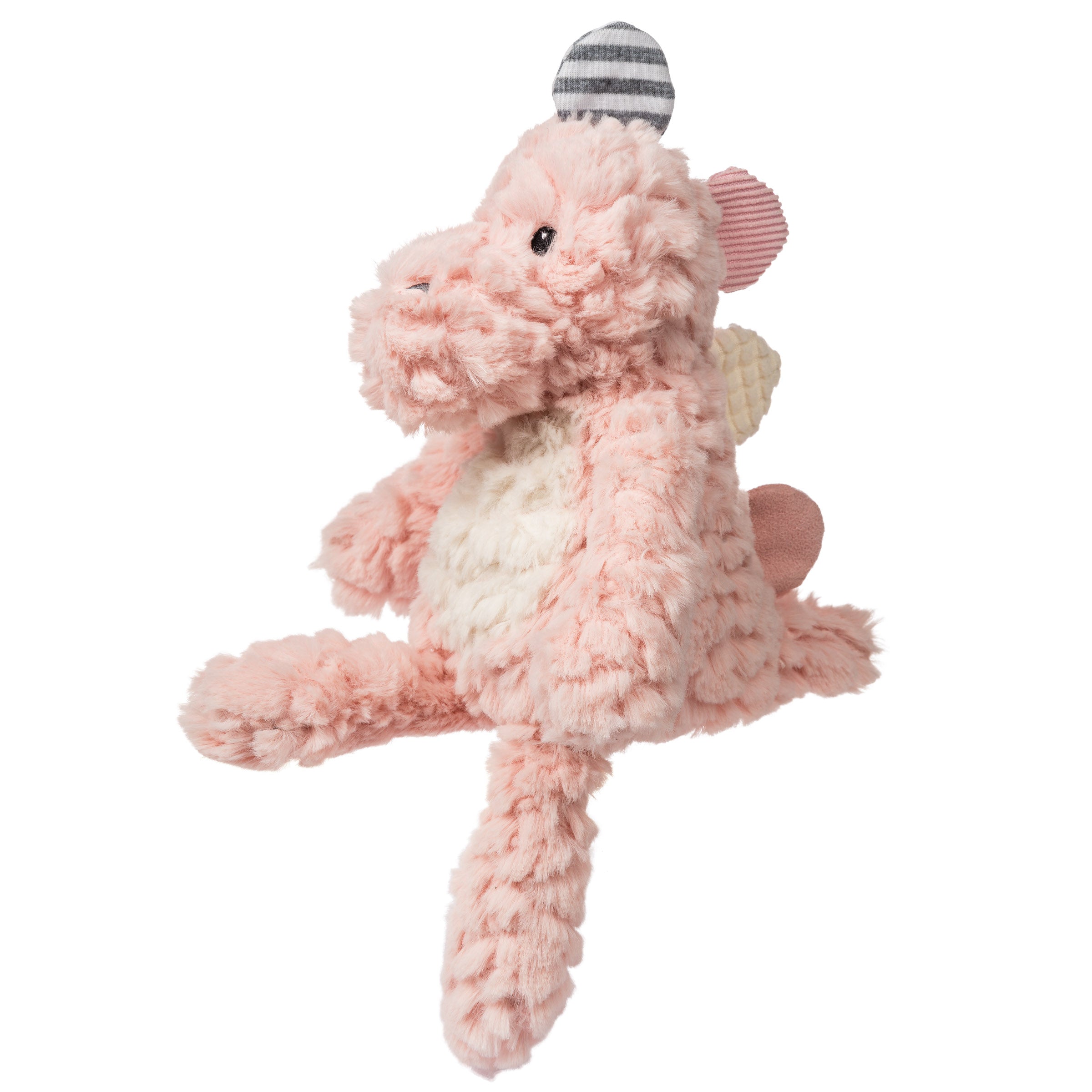 A soft pink blush stegosaurus cuddly toy