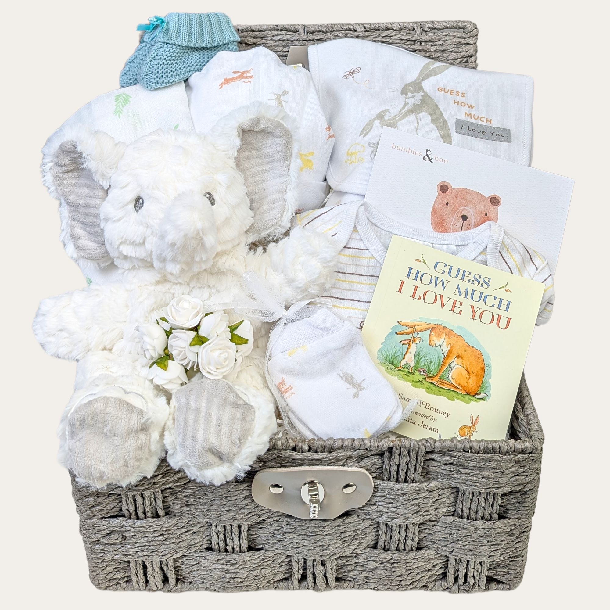 baby gifts hamper with a green clothing set elephant comforter soft toy baby booties baby blanket bumbles and boo